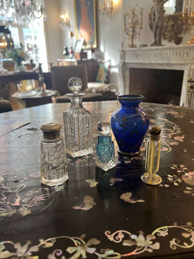 A collection of glasses and scent bottles