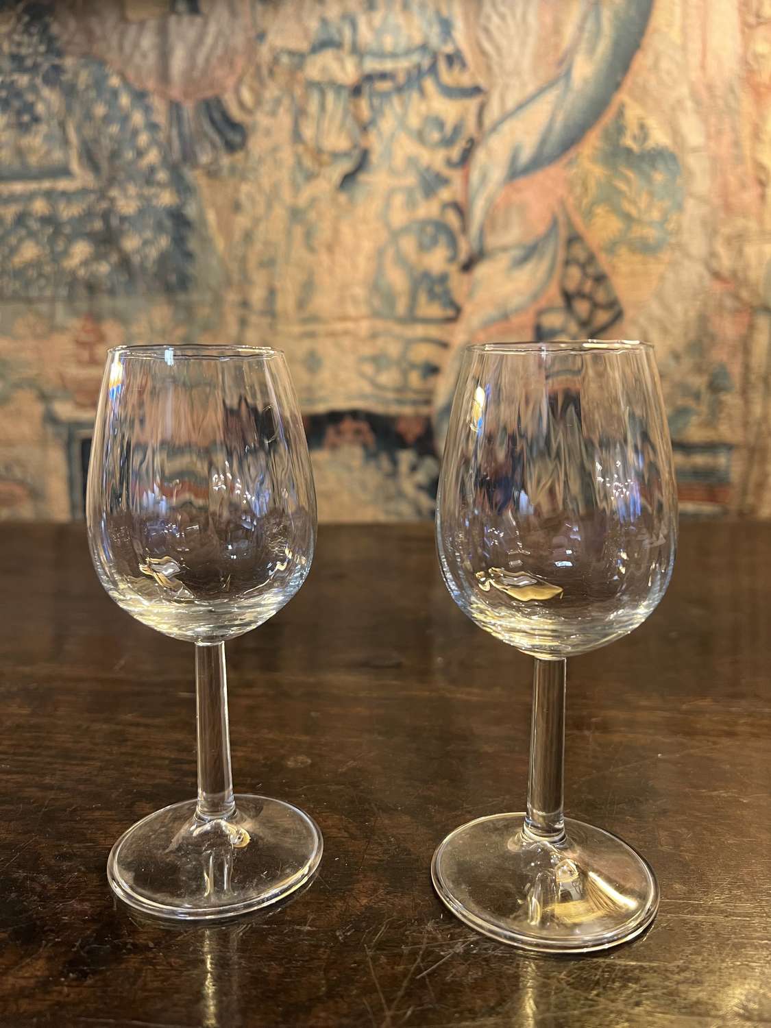 A pair of small wine glasses
