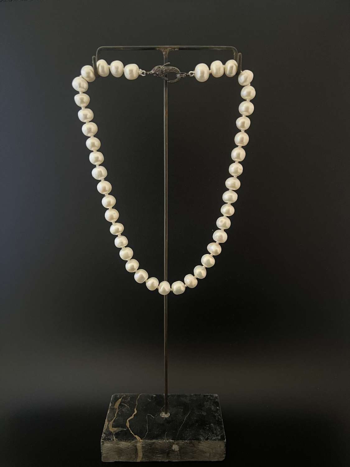 A Pearl necklace with diamond clasp