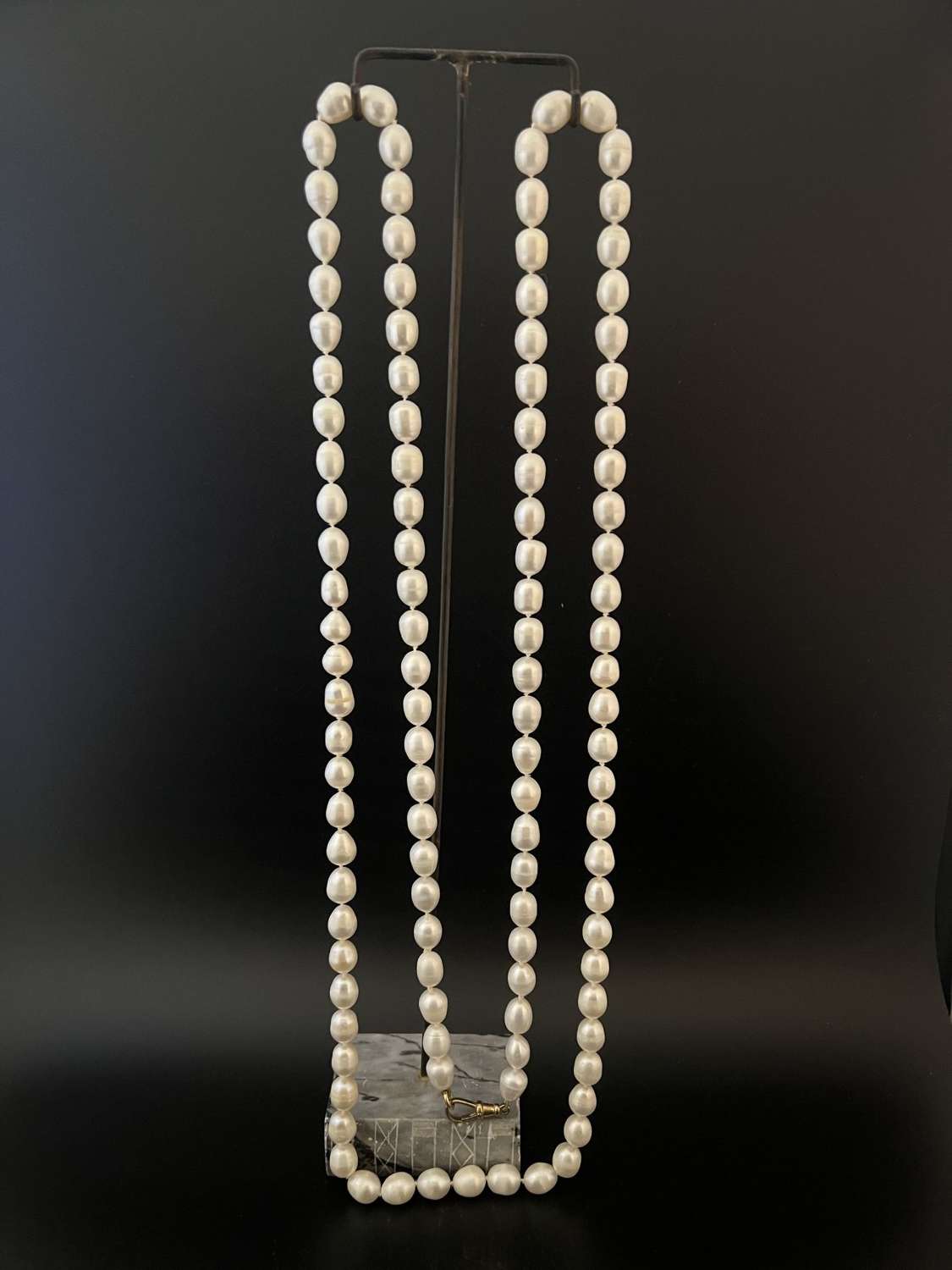 A long Pearl necklace