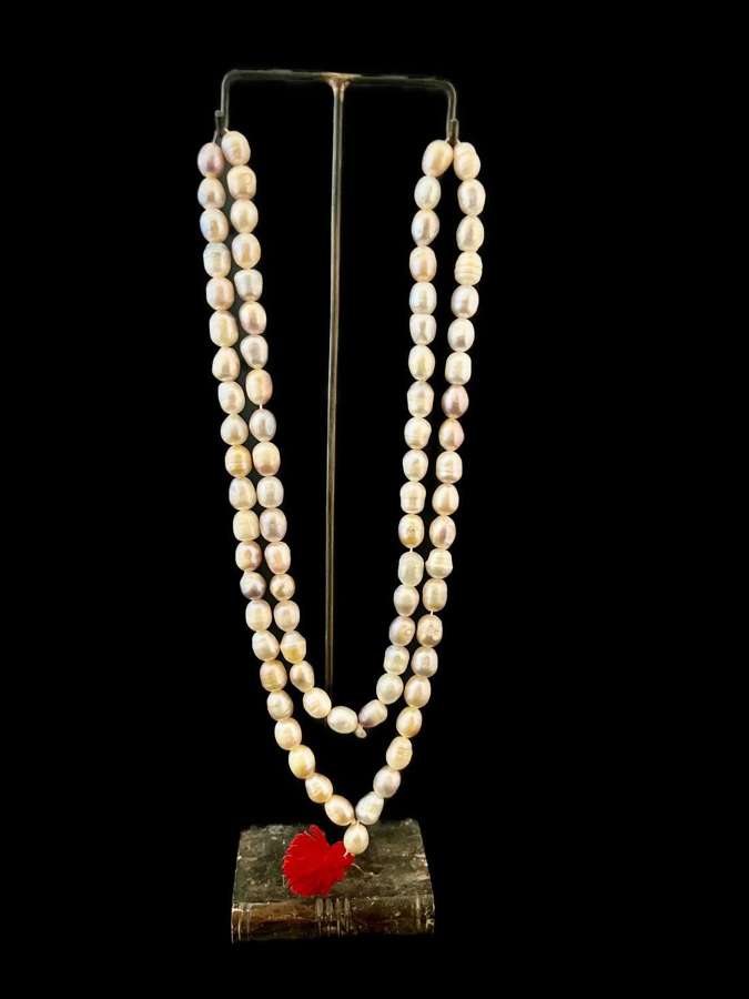 Pink Pearl necklace with red tassel