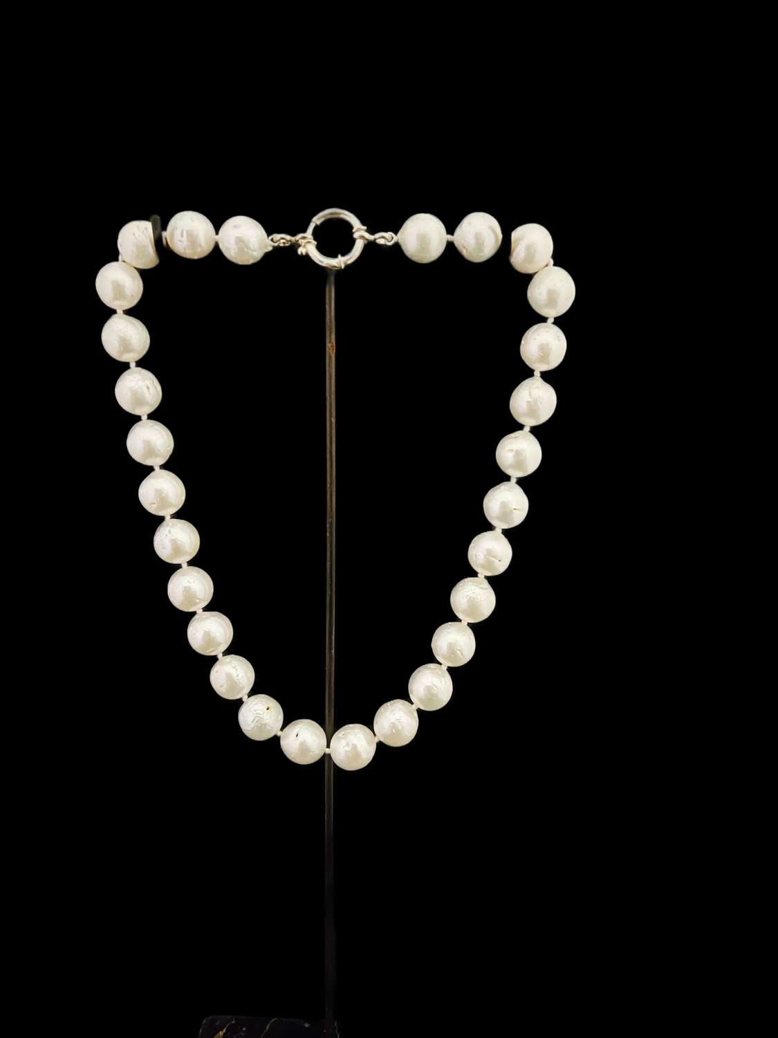 A Pearl necklace with silver clasp