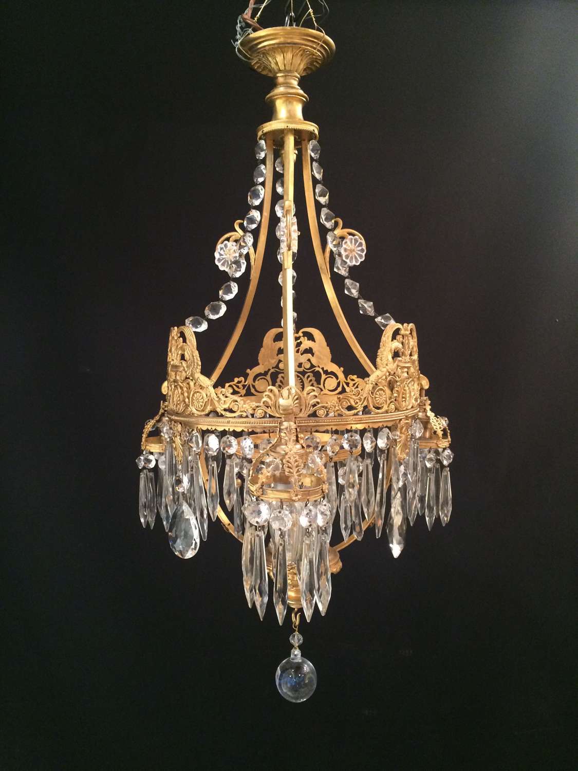 An unusual cut glass and gilt chandelier